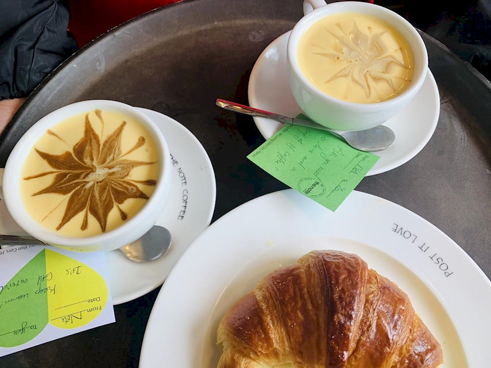 A sip of delicious egg coffee while reading sweet notes from visitors all over the world